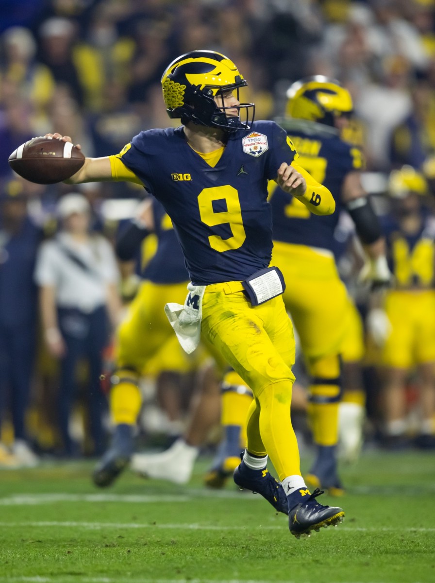 Michigan quarterback J.J. McCarthy throws against TCU